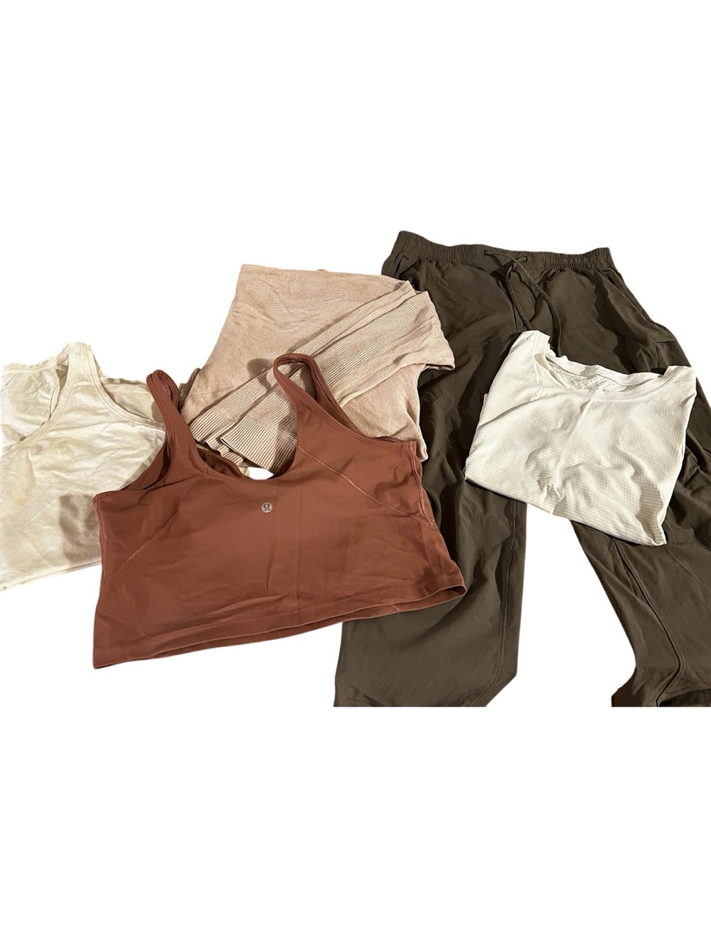 Reseller bundle of Lululemon clothes - leggings, tank tops, sweaters.